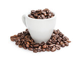 heap of coffee beans in cup