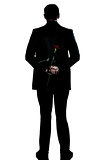 silhouette man back  full length holding a rose flower 