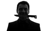  man biting knife silhouette