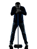 man janitor brooming cleaner boredom silhouette full length