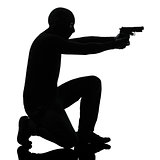 thief criminal terrorist aiming gun man