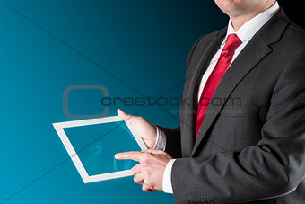 Man with chart on tablet