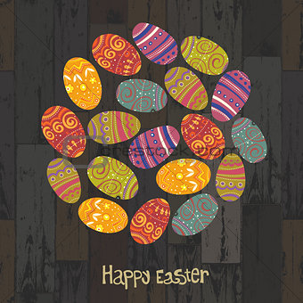 Easter eggs. Circle shaped on wooden planks background. Vector, 