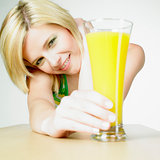 woman with a glass of juice