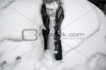 car under the icy crust