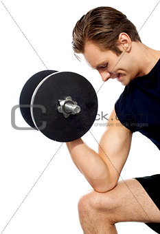 Portrait of young fit trainer working out