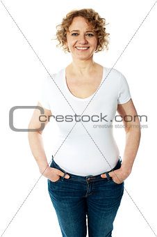 Stylish woman posing with hands in pocket