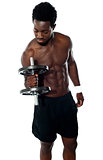 Young man doing biceps excercise
