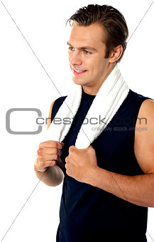 Handsome man with towel around neck