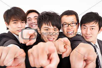 success business group finger pointing to camera