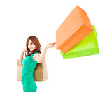 young woman holding shopping bag