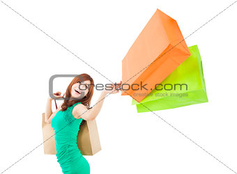 happy young woman holding shopping bag