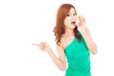  surprised young woman shouting and pointing 