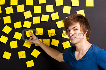 Pointing to a yellow note