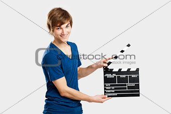 Holding a clapboard