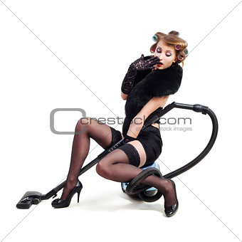 Girl with vacuum cleaner