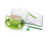 Coffee cup and office supplies