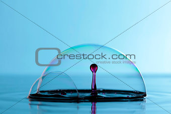 Water drops in the soap bubble