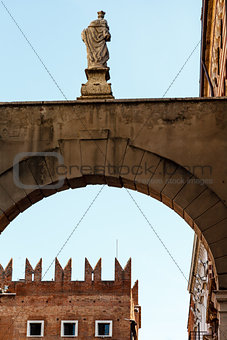 Arch and Statue near Piazza delle Erbe in Verona, Veneto, Italy