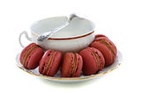Macaroons and white cup.