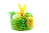 Green basket with Easter eggs.