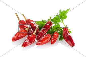 Red chili or chilli pepper and parsley leaves