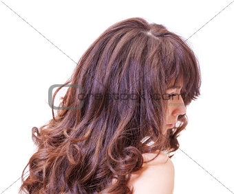 Pensive woman with beautiful hair