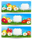 Easter banners with Easter eggs and colorful flowers