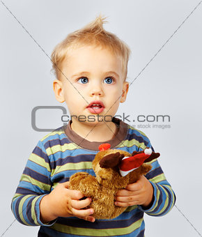 Baby boy with toy