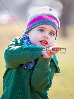 Baby boy portrait outdoor in spring