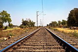 Indian Railroad track with overhead cables