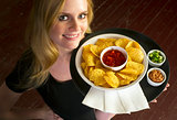 Young Attractive Female Server Brings Appetizer Chips Salsa Food