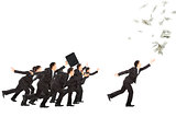 excited businessman running to the money