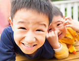 close up of two happy asian little boy