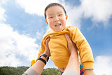 happy asian kid with cloud background