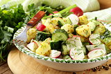 potato salad with cucumber and radish