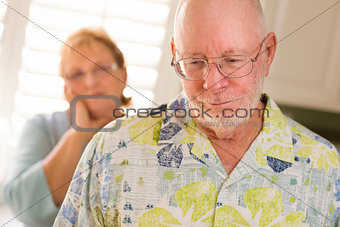 Senior Adult Couple in Dispute or Consoling