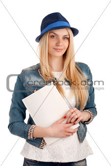 Young woman holding magazine