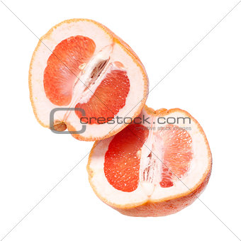 Red grapefruit, half and whole fruit, white background
