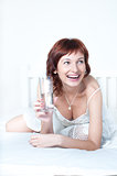 Young Woman with glass of fresh Water 