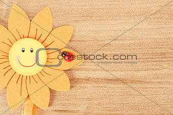wooden board for spring message with flowers
