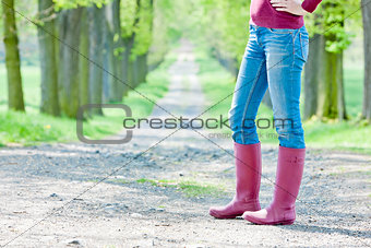 detail of woman wearing rubber boots