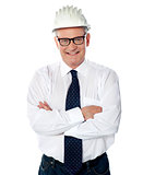 Portrait of happy senior foreman with hard hat