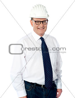 Handsome smiling aged engineer with hard hat