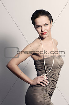 Young woman in elegant dress