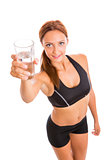 Fitness woman holding a glass of water
