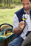 Vintner with glass in the field