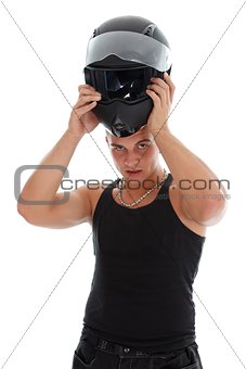 Guy taking off his helmet