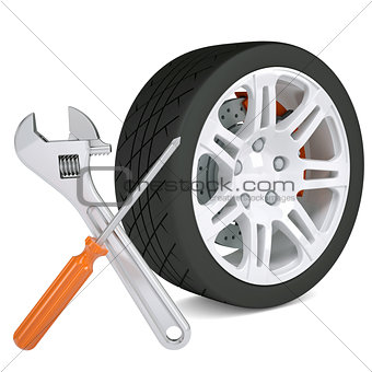Wheel, wrench and a screwdriver