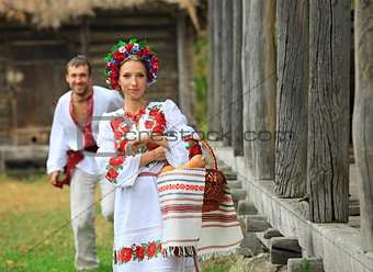 Young couple in Ukrainian style clothes
